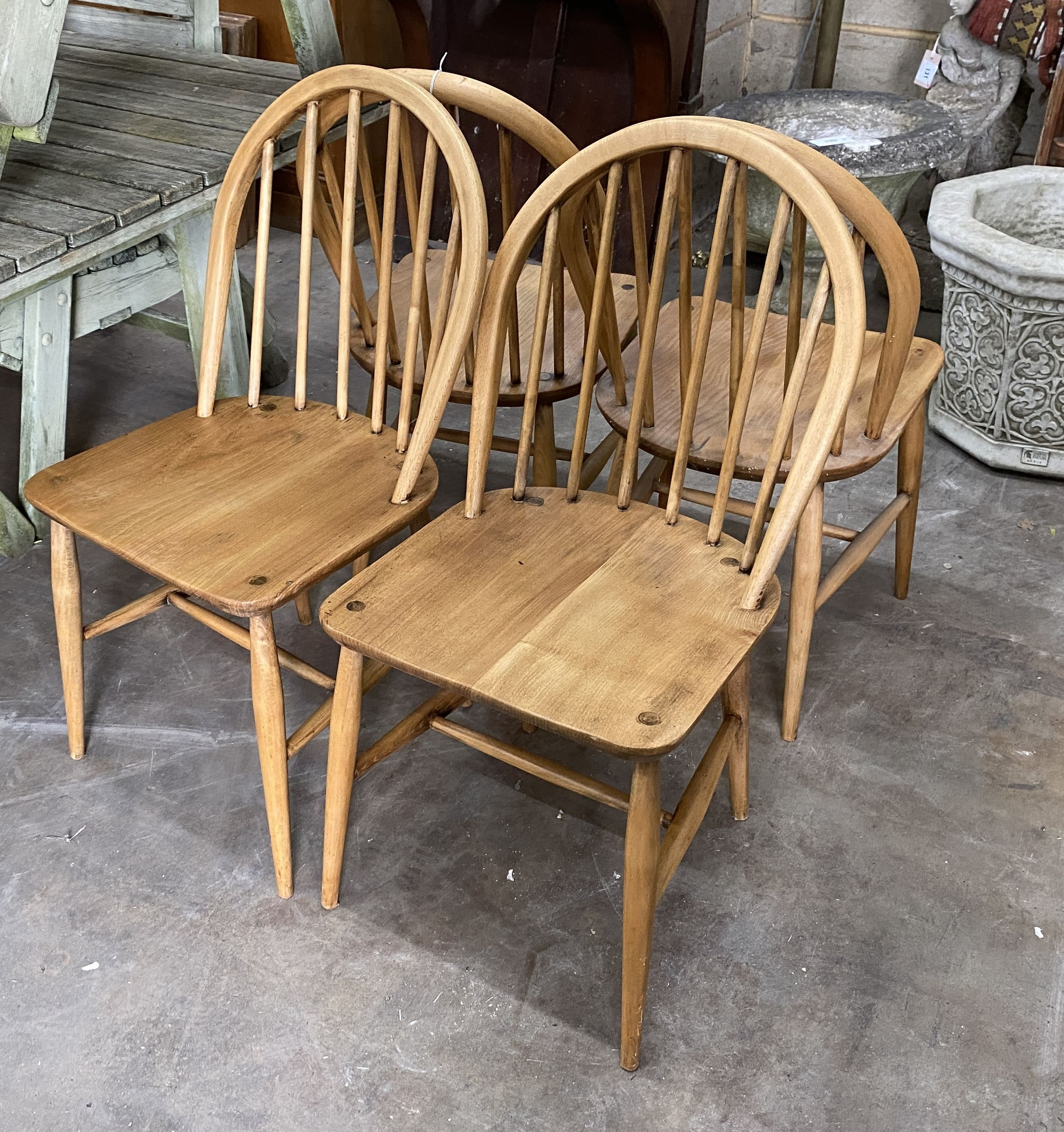 A set of four 1950's Ercol elm and beech chairs